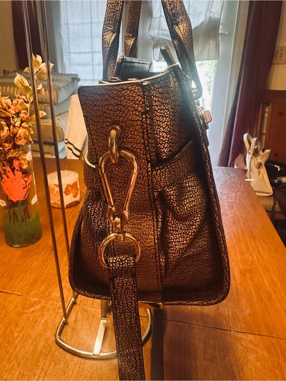 Coach Swagger 27 in Metallic Bronze Pebble Leather with Gunmetal Hardware
